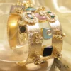 Regal Charm Bangle Bracelet